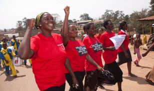 Women participate in a march marking international women's day in Mubende, Uganda, East Africa.