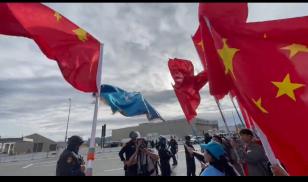 Drowning in PRC flags 
